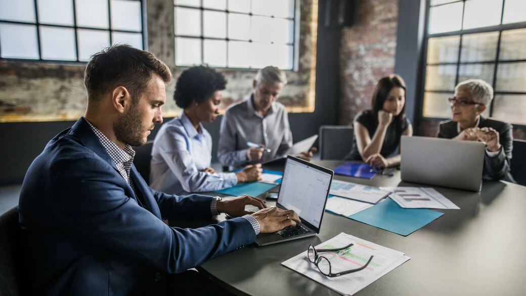 Businessman using a laptop at a office