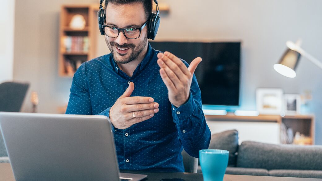 Man in a remote meeting